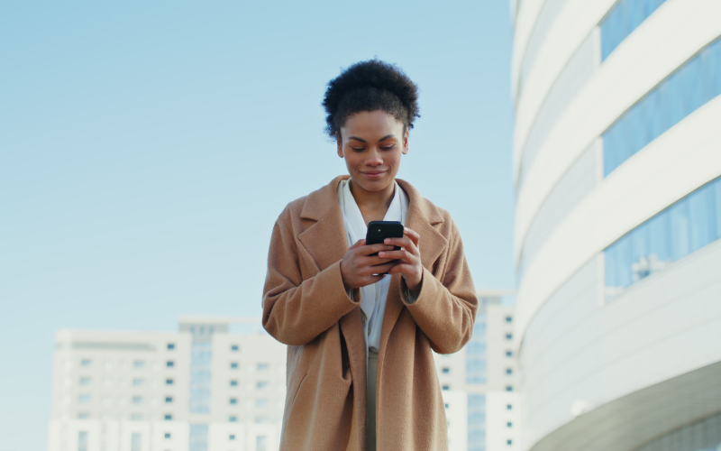woman on phone in the city